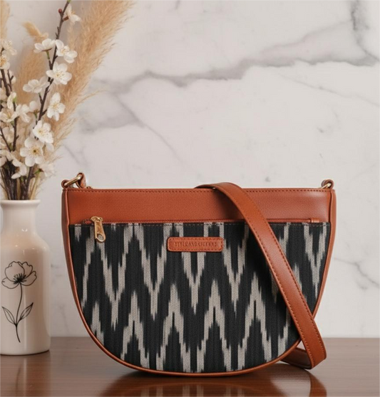 Style and Culture Handcrafted Black Ikat Crescent Sling Bag