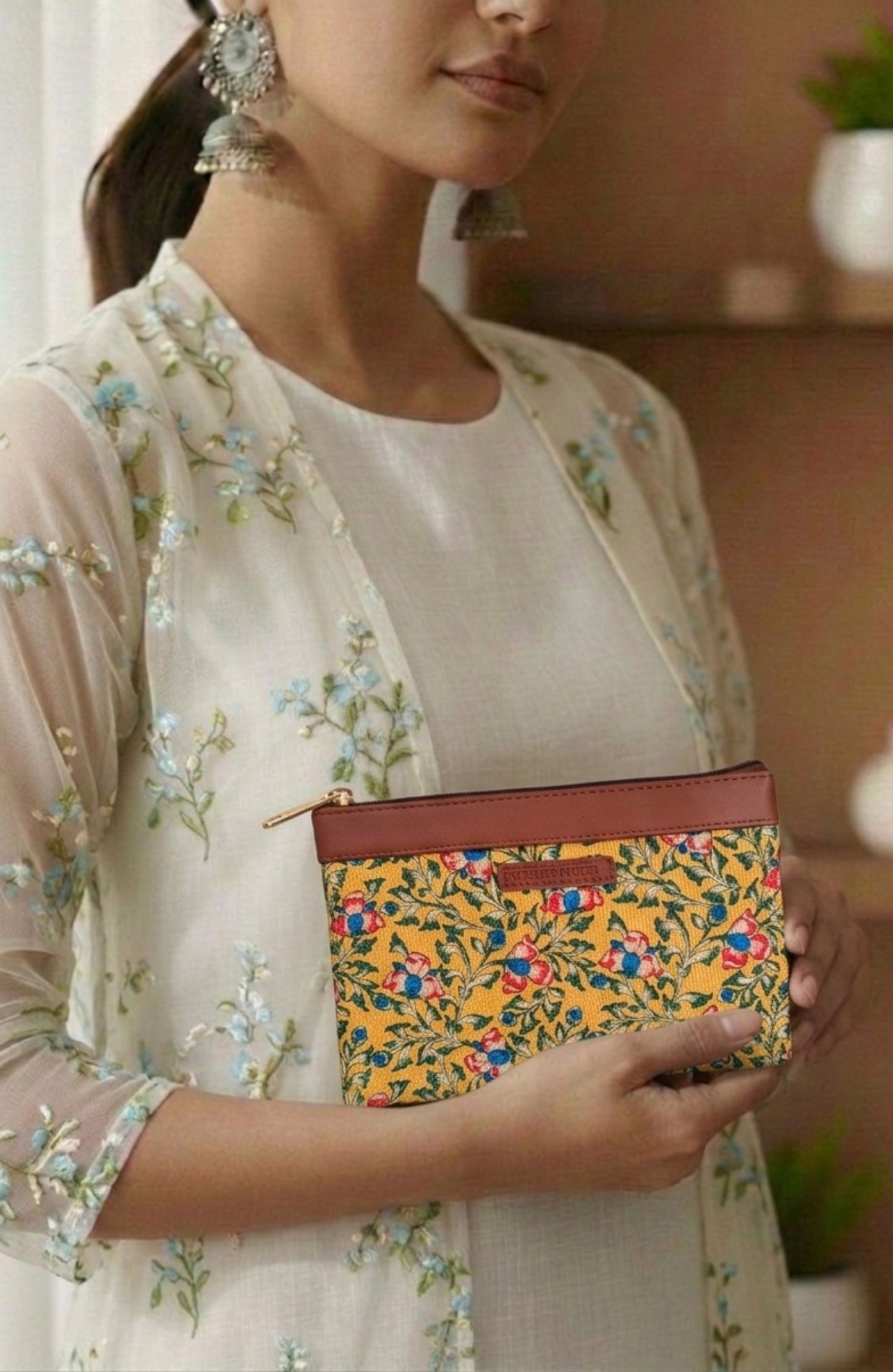 Style and Culture vegan floral motifs pouch perfect for daily essentials.